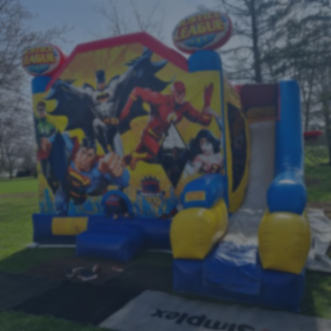 Colorful bounce house with an attached slide